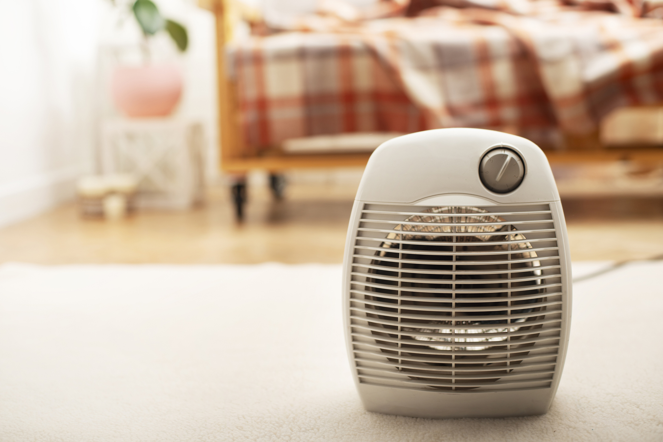 Space heater on the floor of a living room